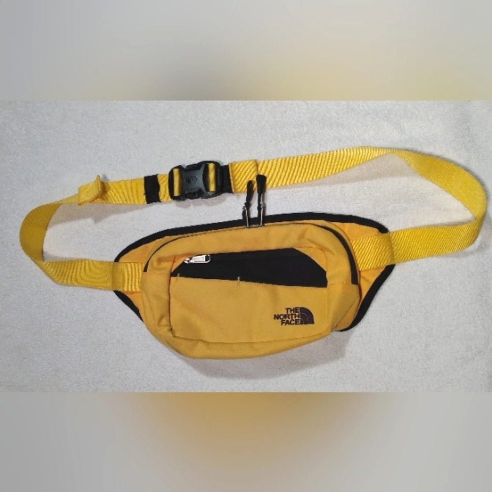 The NORTH FACE Yellow Script Waterproof Fanny Pack Crossbody waist purse…